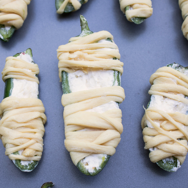 Jalapeño Popper Mummies -- made with crescent dough strings.