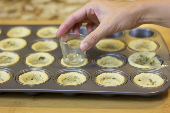 Make cookie cups with a muffin tin and cookie dough! Shape with a shot glass.