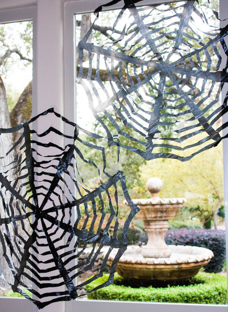 Easy DIY Trash Bag Spiderwebs