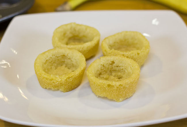 Mini cookie cups! Fill with pudding and top with whipped cream